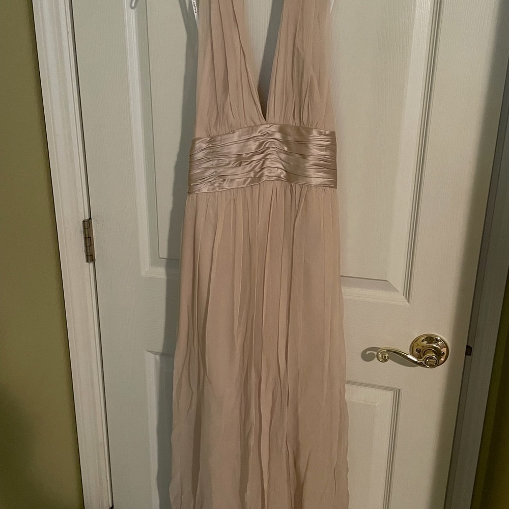 Backless champagne color dress by Maggie London size 8